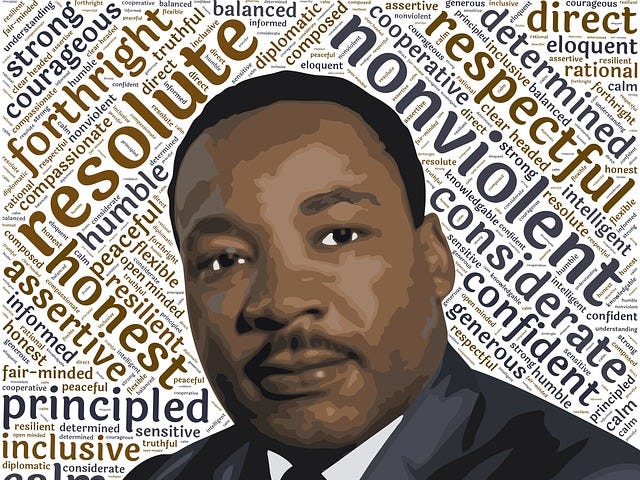 Photo of Martin Luther King, Jr. Background contains words like principled, forthright, resolute, respectful, courageous.