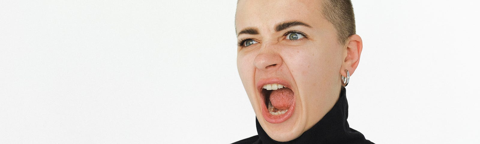 Woman In Black Turtleneck Shirt Yelling