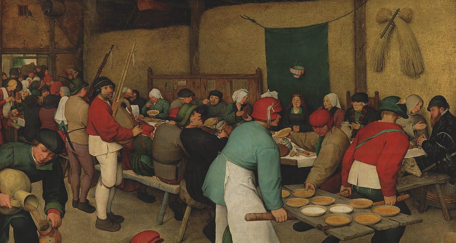 Peasants cheerfully celebrating a newly married couple. They don’t have much: soup, porridge, and bread, but it seems enough to have fun.