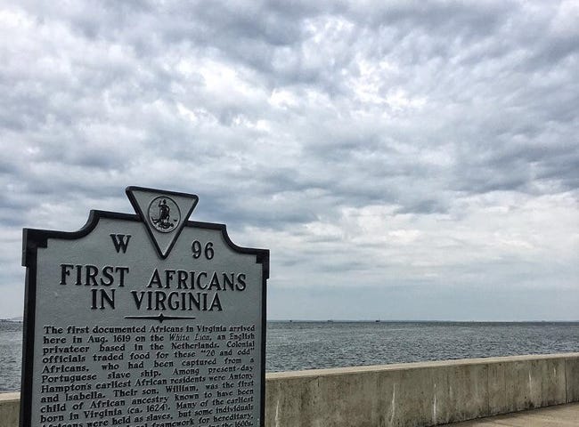 A National Park Service plaque at Point Comfort, VA honoring the first Africans forcibly brought to the British colonies.