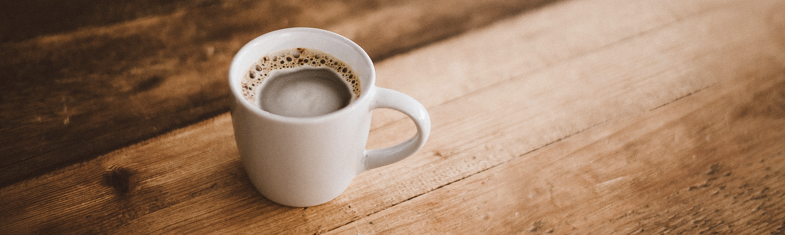 Coffee cup on a wooden table