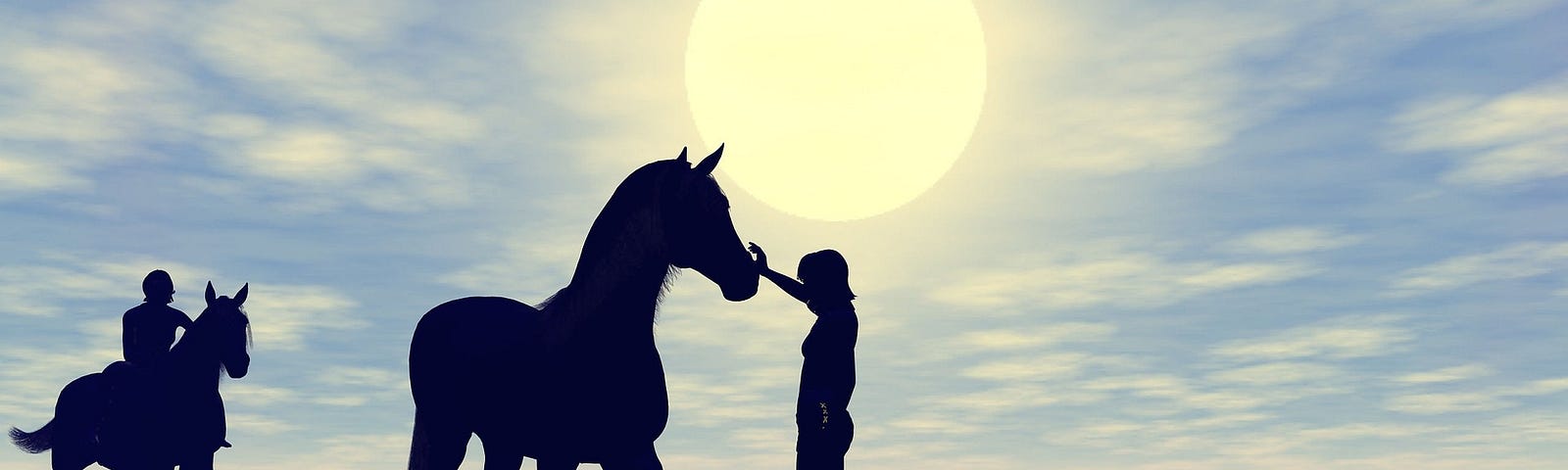 2 horses silhouetted against a bright blue sky just before sunset. One horse has a rider and the other has a person standing in front touching its nose.
