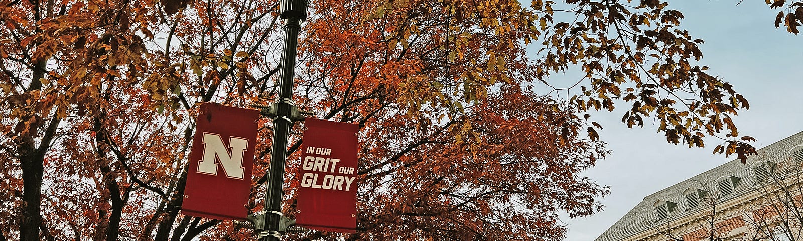 A banner outside the union says “In Our Grit, Our Glory”