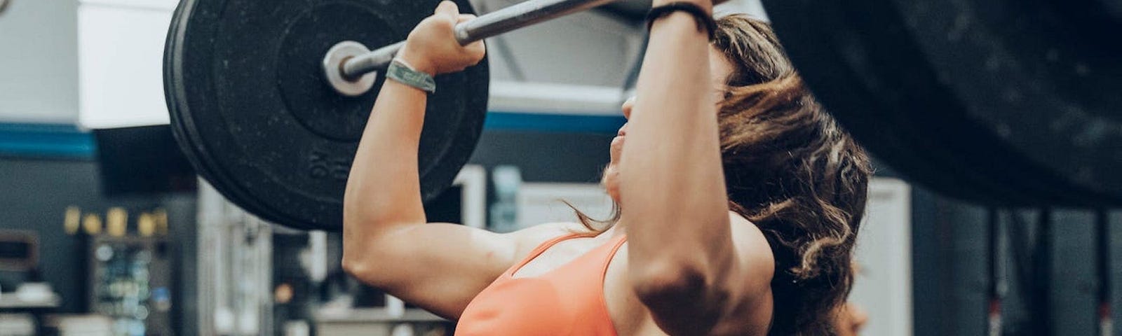 A woman lifting weights.