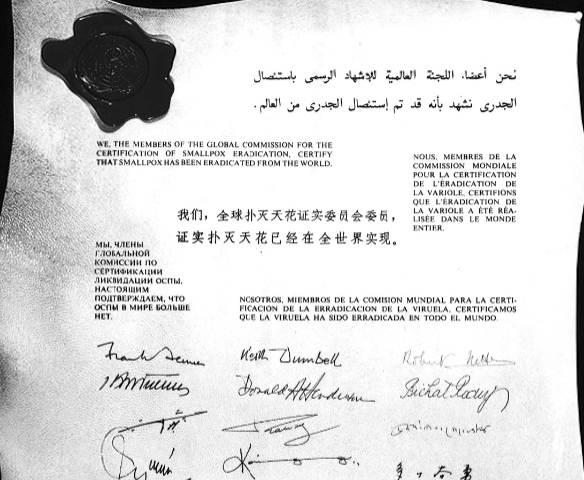A document from the World Health Organization certifying the eradication of smallpox in 1979. The document is in various languages and signed by different people.