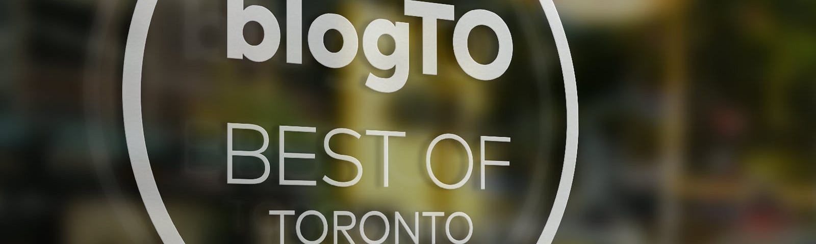 Logo design and brand typography for BlogTO shown in an example context