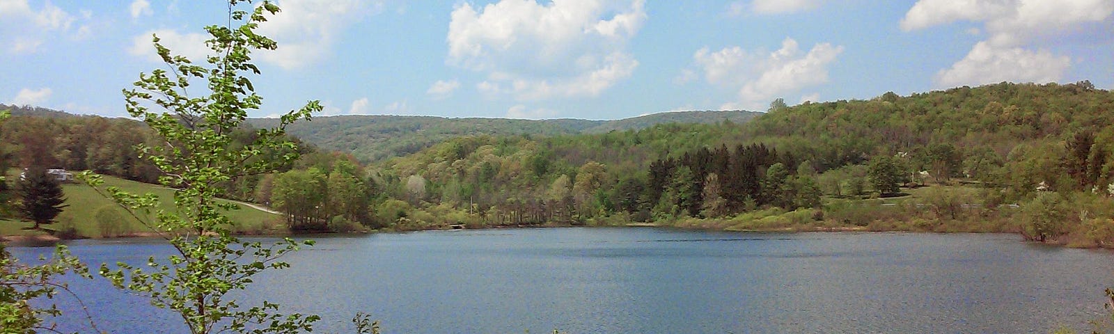 Reservoir under sunny skies.