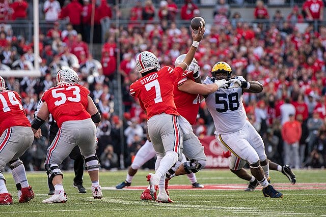 C.J. Stroud playing quarterback in college for Ohio State.