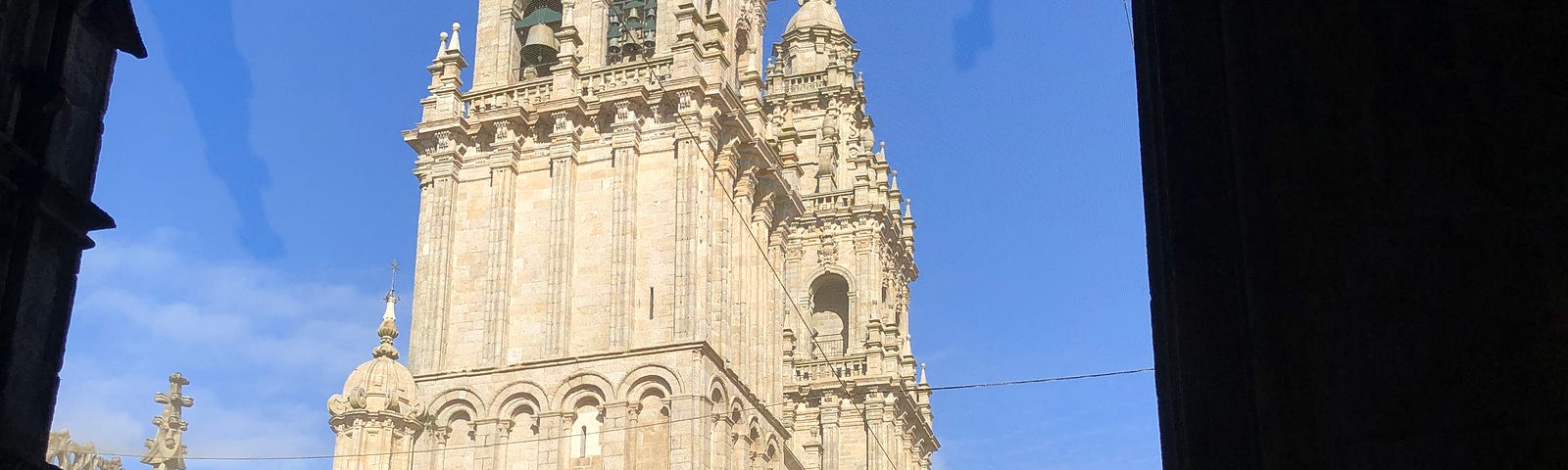 Picture of Santiago Cathedral with the author in the shadows in the foreground