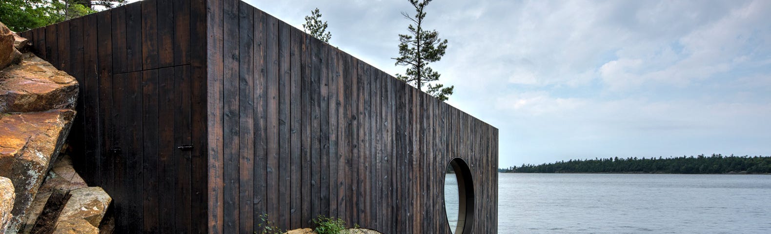 This sauna built into a prehistoric rock boasts epic sunset views
