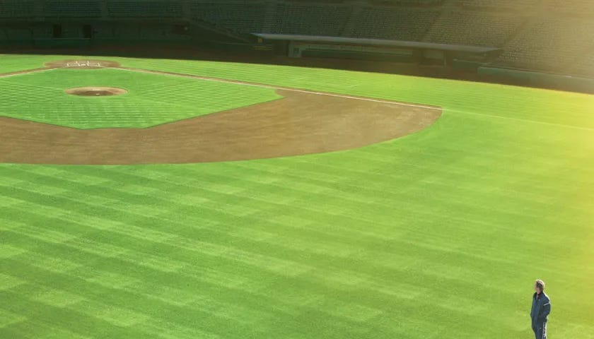 Moneyball Poster, Overhead shot of Brad Pitt standing on a baseball field