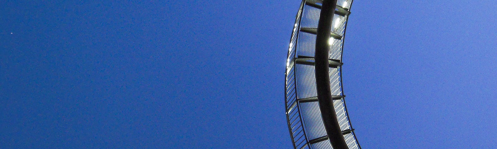 Looking up at the art installation Tiger & Turtle. Duisburg, Germany, August 28, 2023.