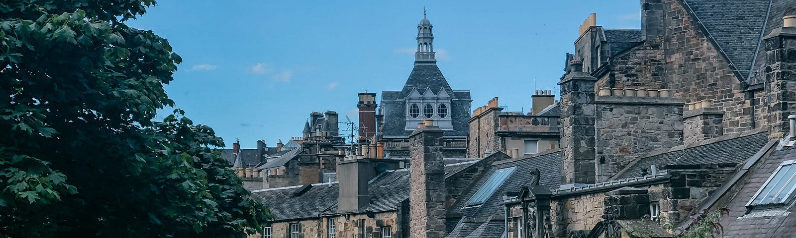 Eerie houses next to the gravestones of Greyfriars Kirkyard in Edinburgh