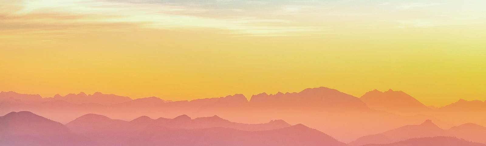 Landscape of mountains and sky stretching to the horizon