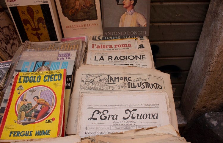 Old newspapers and books for sale in Rome, Italy