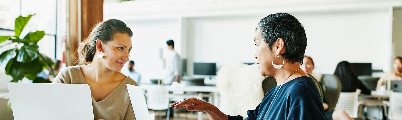 A financial planner talks to a client (the author is not pictured).