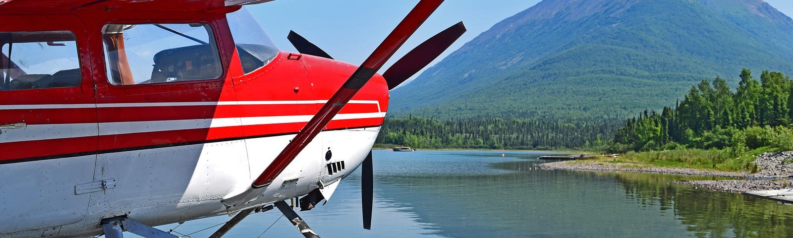 A Cessna Stationair rests on the lake at Port Alsworth, Alaska.