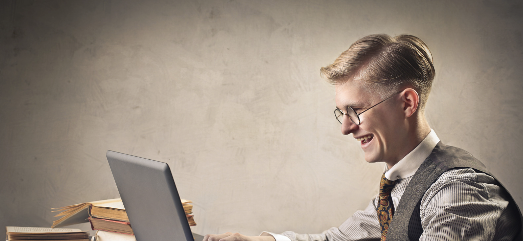 Young blonde man working very focused