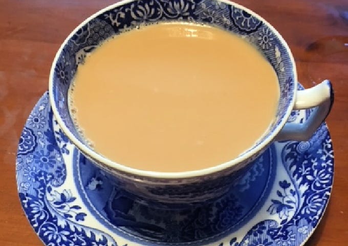 A picture of a beautiful blue and white Spode tea cup and saucer.