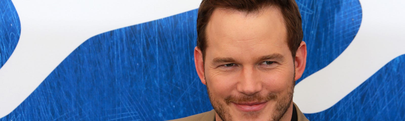 Chris Pratt has an all-time douchey smile.