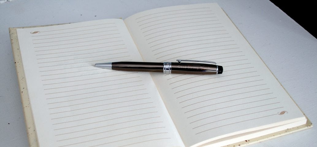 Notebook with pen