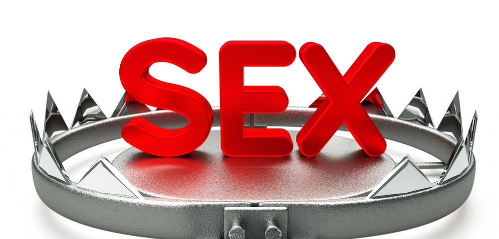 An animal trap and the word SEX