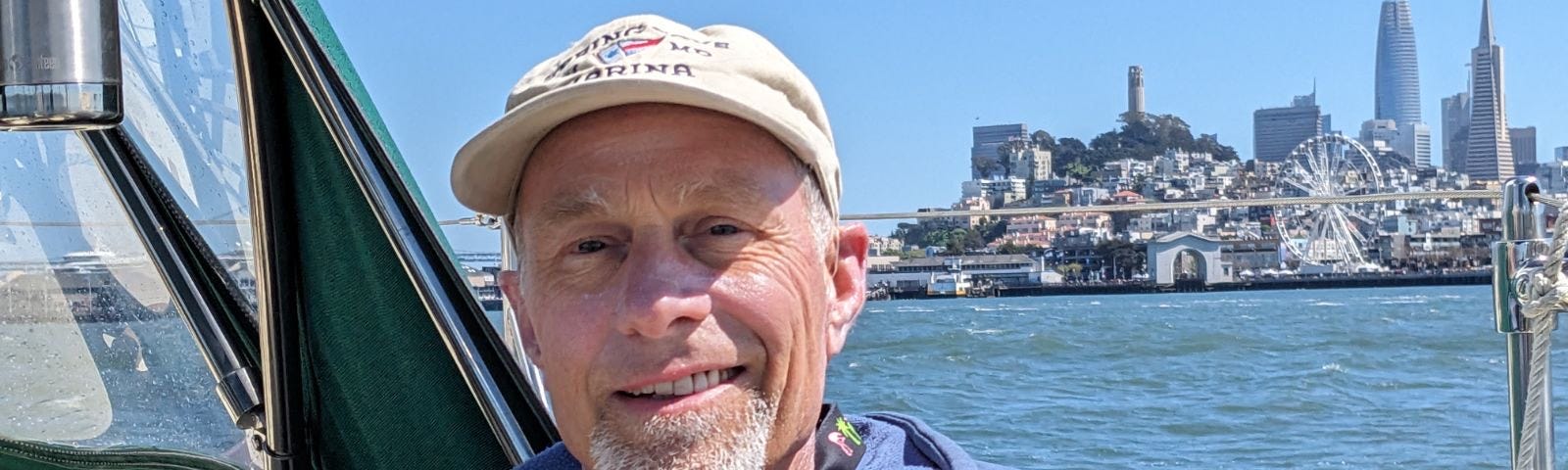 The author sailing on his boat.