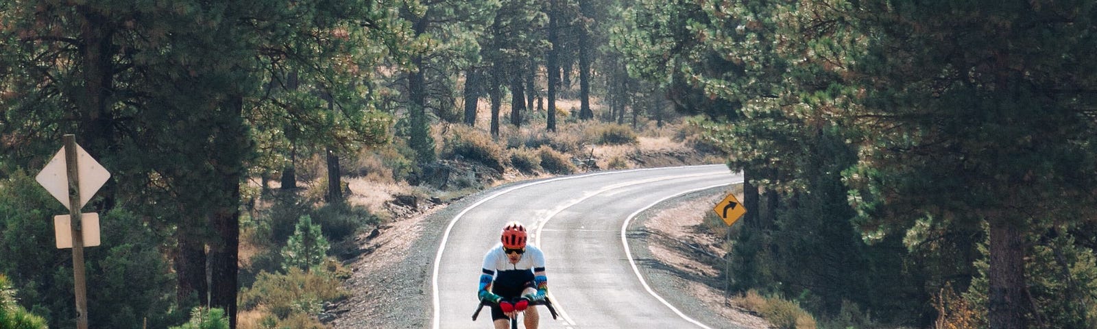 Aero tuck bike riding on the highway