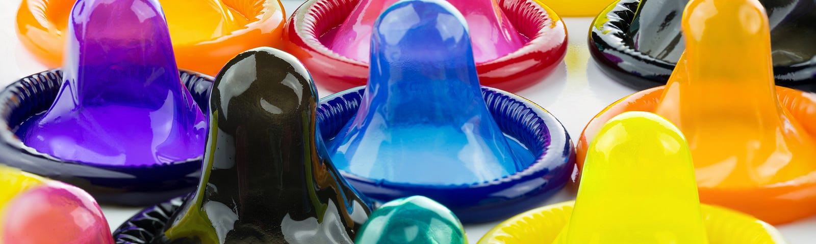 A group of colorful condoms.