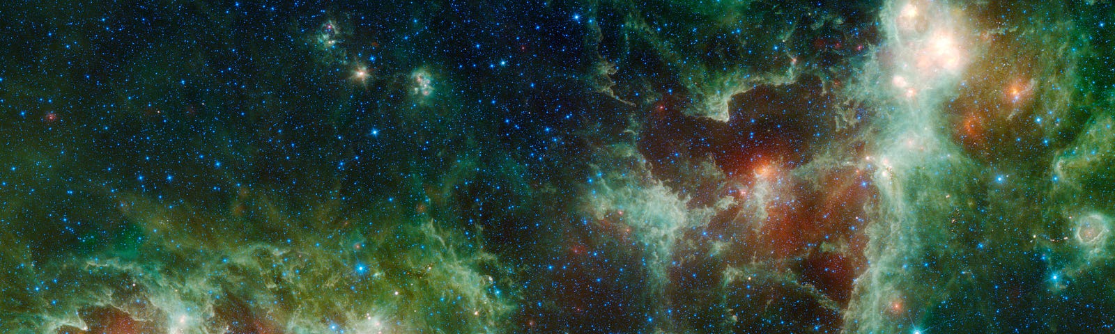 The Heart and Soul nebulae are seen in this infrared mosaic from NASA’s Wide-field Infrared Survey Explorer, or WISE. Also visible near the bottom of this image are two galaxies, Maffei 1 and Maffei 2. Maffei 1 is the bluish elliptical object and Maffei 2 is the spiral galaxy. All four infra-red detectors aboard WISE were used to make this image. Colour is representational: blue and cyan represent infra-red light at wavelengths of 3.4 and 4.6 microns, which is dominated by light from stars.