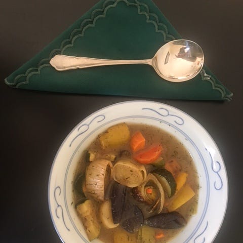 Bowl filled with chunky vegetable soup