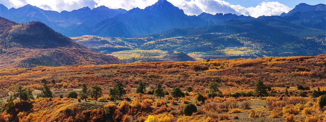 Looking across a field toward mountains in Colorado, United States