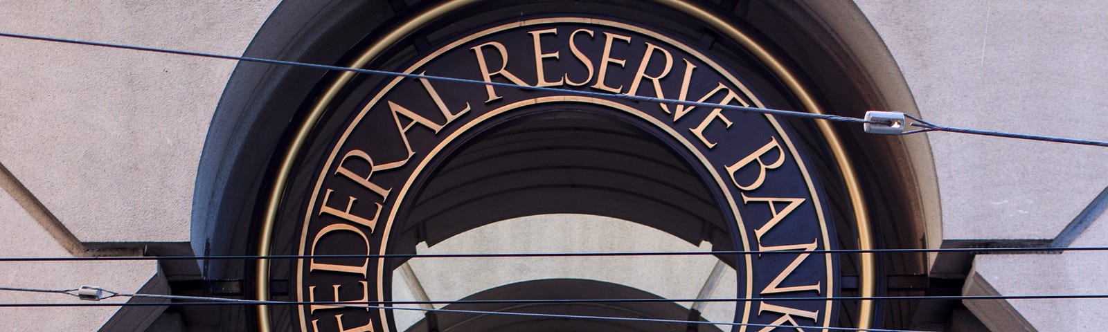 Sign on a building stating “Federal Reserve Bank San Francisco.”