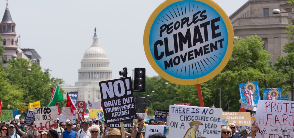 Protestors gather in 2017 protesting the Trump Administration’s climate policies.
