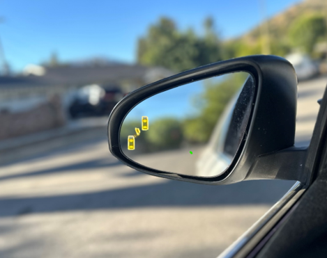 Photo of the blind spot indicator light on the  side mirror.