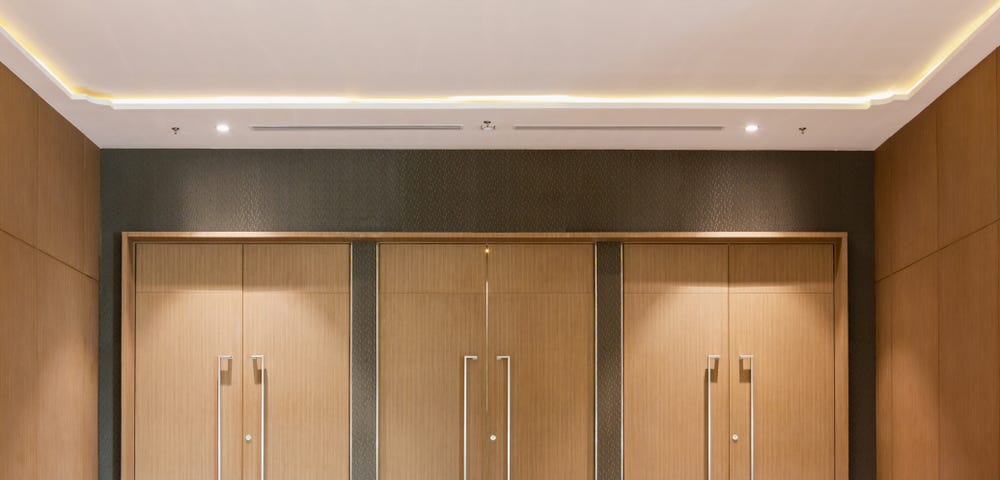 Three cloased conference room doors