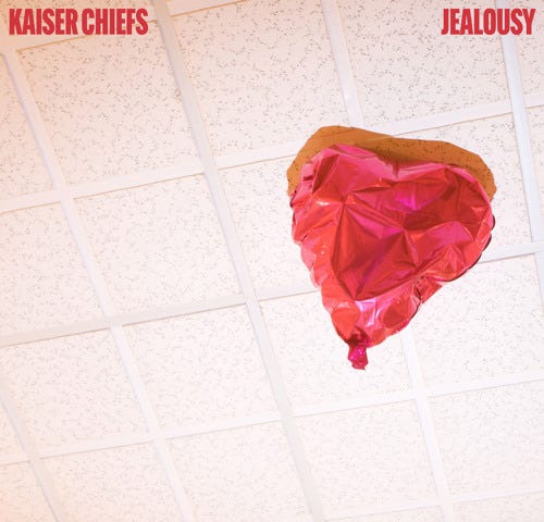Kaiser Chiefs “Jealousy” single cover art; slightly deflated red heart balloon that has floated to a tile block ceiling