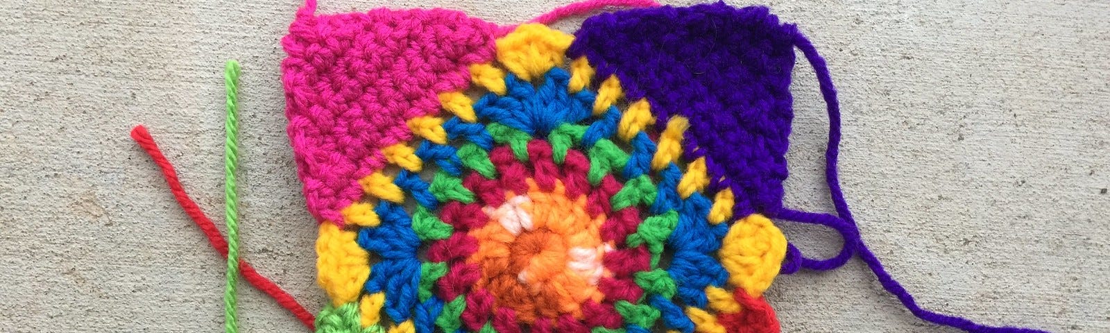 A multicolor crochet granny square for difficult times