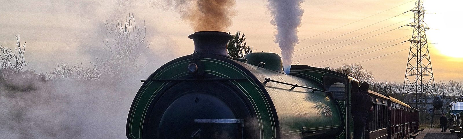 Steam train at East Tanfield railway station