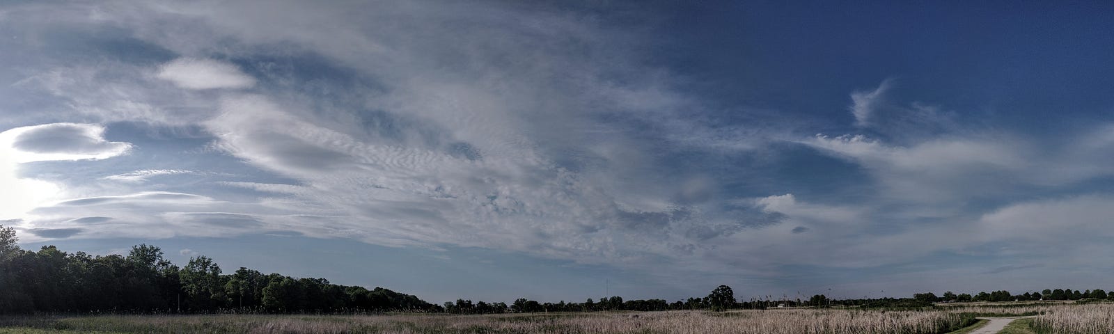 a long country road against a background of thunder clouds (how to grow from criticism)