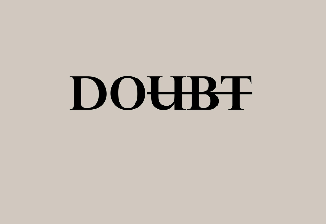 Doubt Written With Ubt Cancelled Out On A Plain Surface
