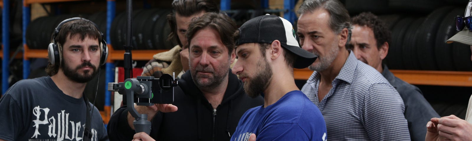 One Punch on set with crew and actor Mirko Grillini overlooking.