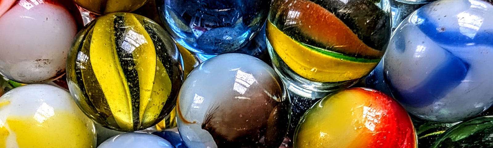 Closeup view of colorful glass marbles