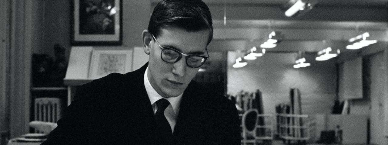 Yves Saint Laurent, photographed in his studio. Image Credits: Magnum