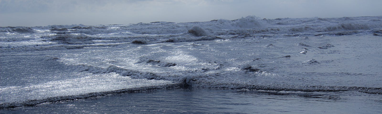 Waves breaking on a beach