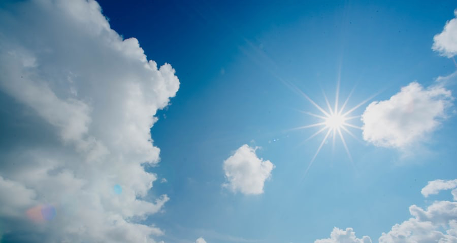 photo of sunbeam in a blue sky