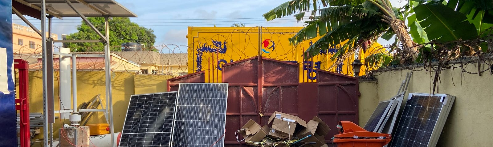 Solar pannels on the ground in a yard