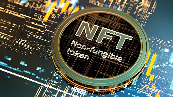 A picture of a round token with the letters NFT meaning Non Fungible Token.