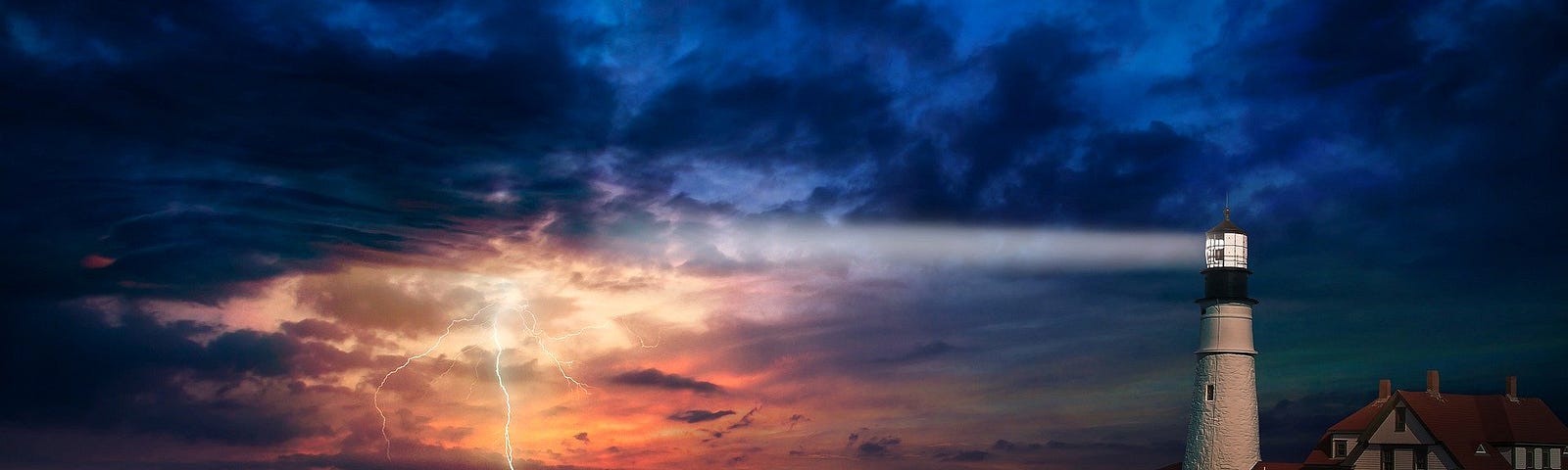 A lighthouse on a rocky shore, illuminating its bright light out to the ocean where a storm is brewing.