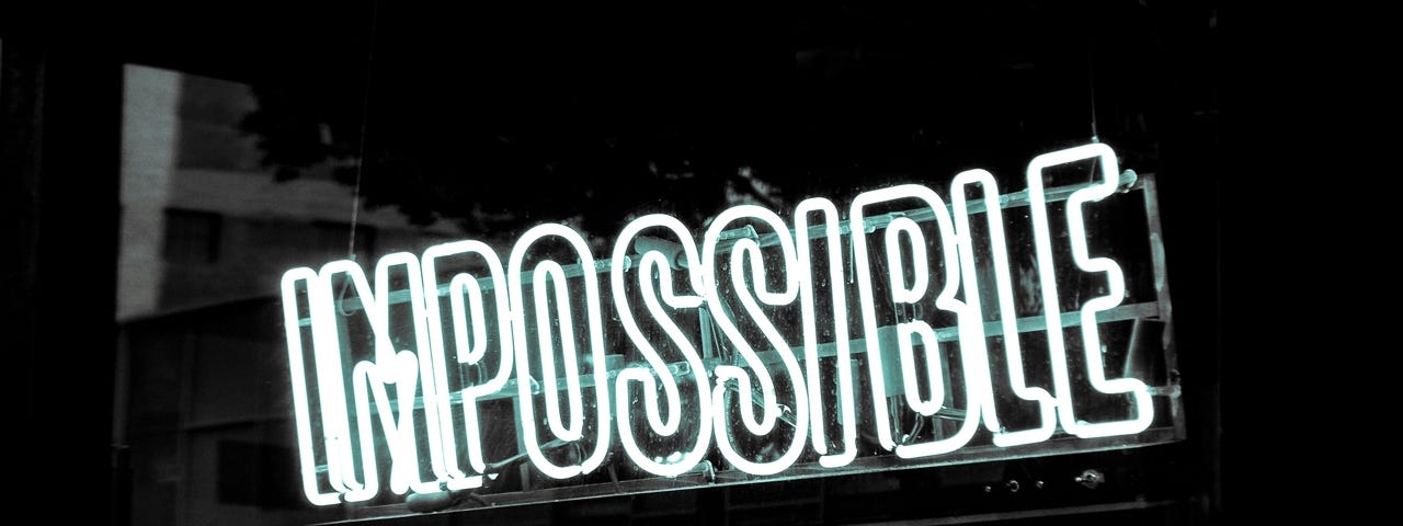 A neon sign that says “impossible”